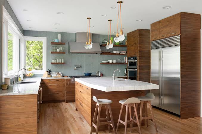 Walnut-toned stylish kitchen cabinets in a mid-century profile