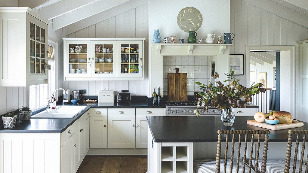 Cottage-style stylish kitchen cabinets with glazed detailing