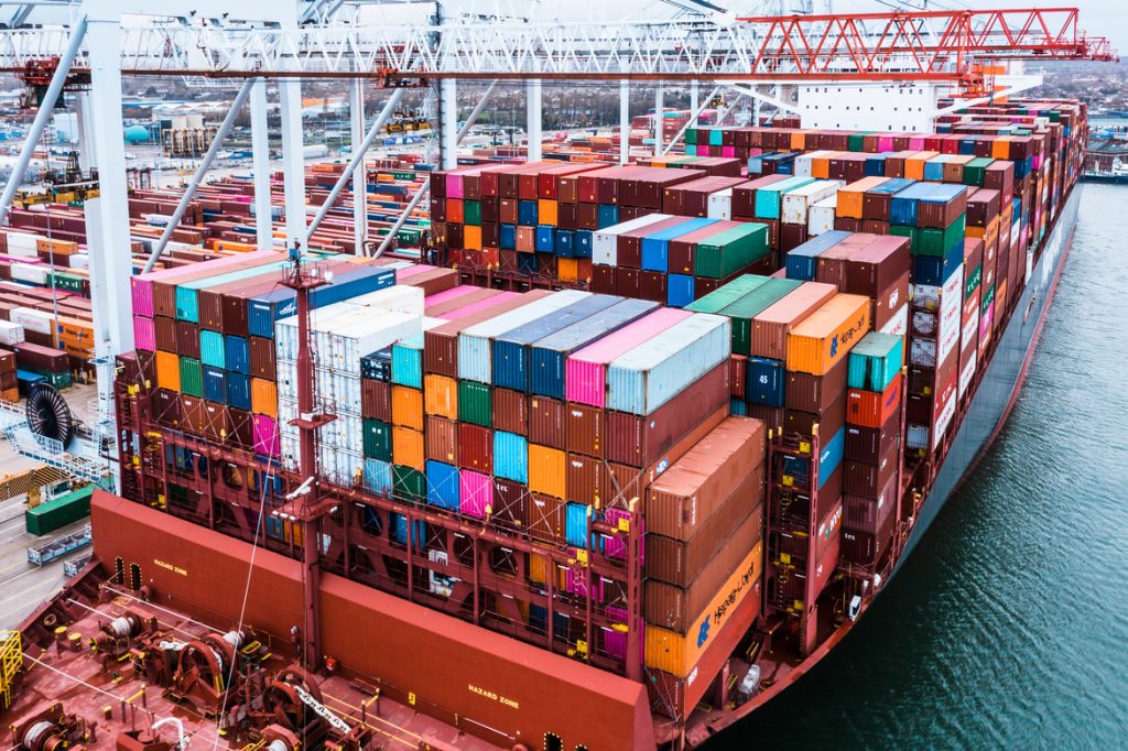 Cargo ship at sea representing the shipping stage of cabinet lead times
