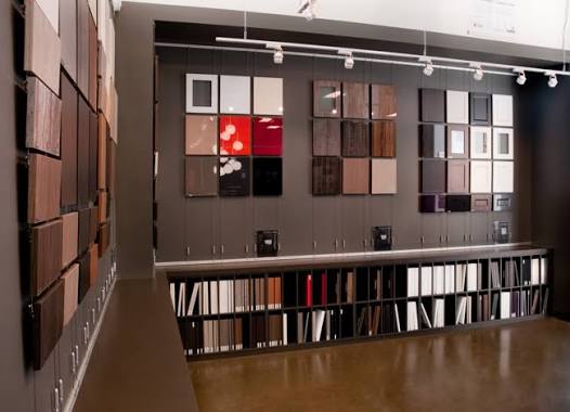 Showroom wall displaying small cabinet door samples
