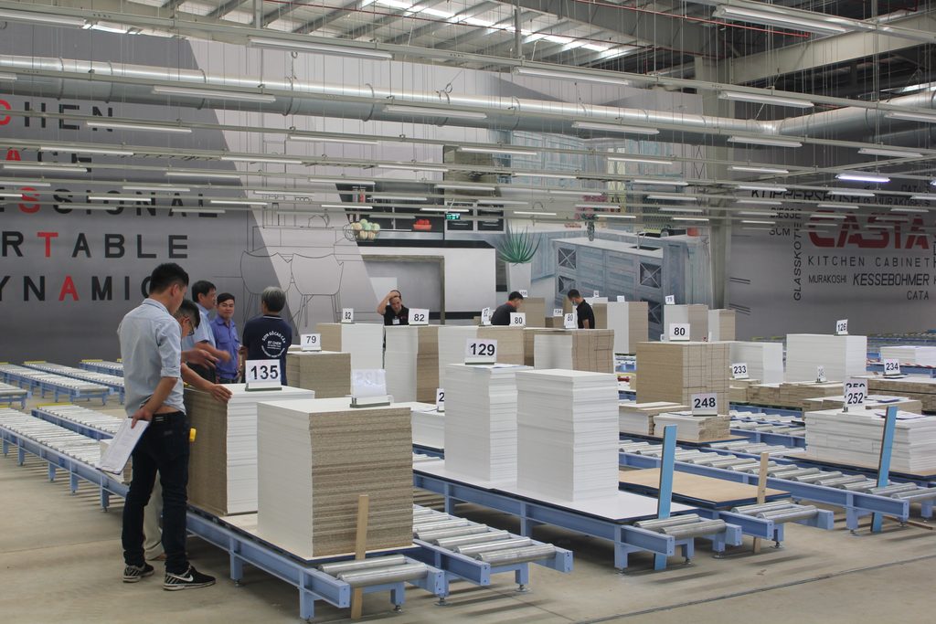 Cabinet factory team preparing a cabinet sample for shipment