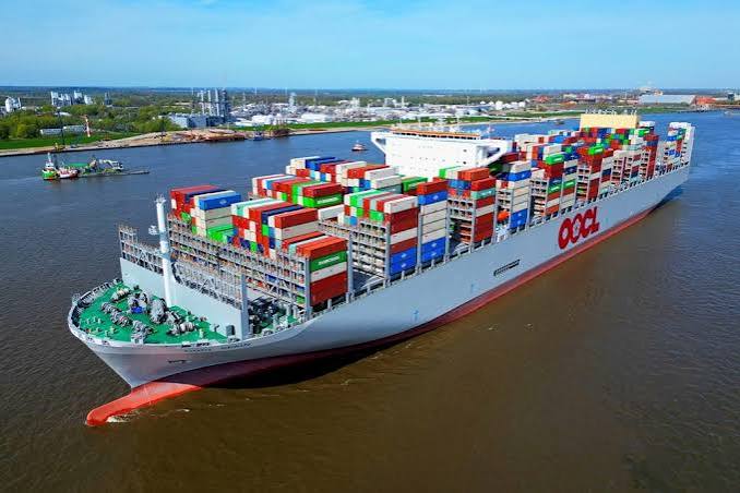 Cargo ship carrying shipping containers at sea