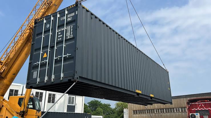 40ft high cube shipping container being loaded with cargo
