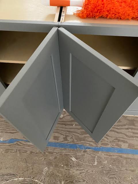 Two cabinet doors of different grades displayed side by side